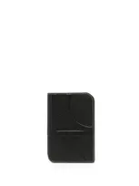 Totême Monogram Embossed Wallet In Black