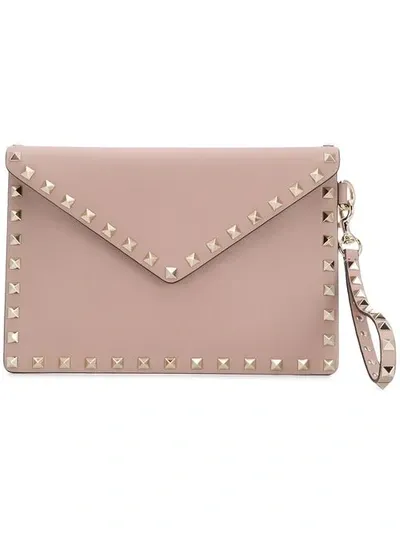 Valentino Garavani Rockstud Leather Clutch Bag In Pink