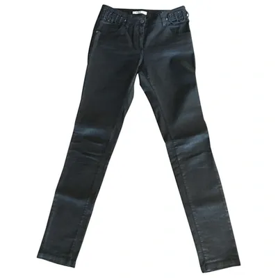 Pre-owned Givenchy Coated Canvas Jeans In Black