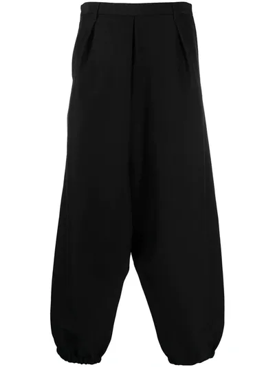 Saint Laurent Cropped Hakama Trousers In Schwarz