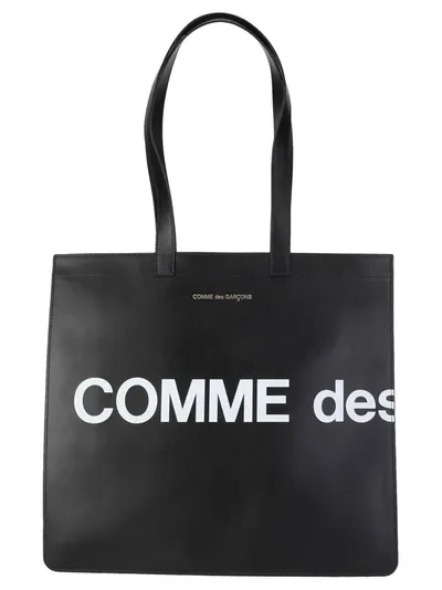 Comme Des Garçons Wallet Huge Logo Printed Tote Bag In Black