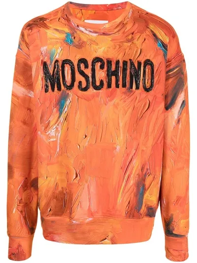 Moschino Painted Logo Crewneck Sweatshirt In Orange