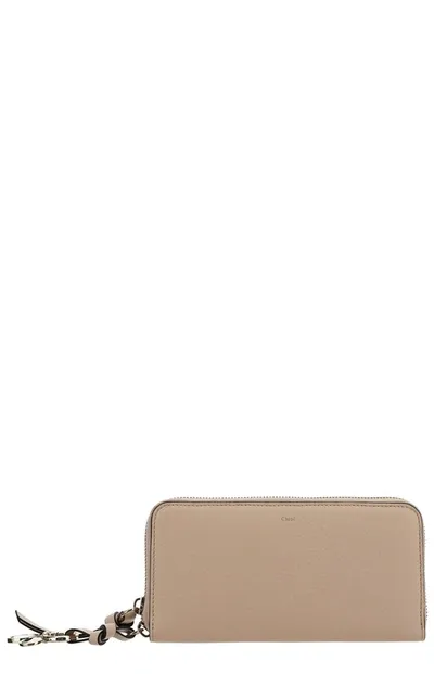 Chloé Logo Detailed Zipped Wallet In Pink