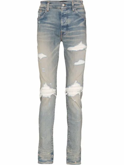 Amiri Light Blue Skinny Jeans With Camouflage Patches In Clay Indigo