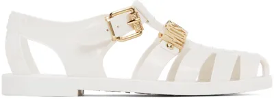 Moschino Logo Embossed Jelly Flat Sandals In Bianco