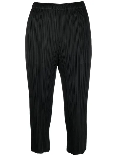 Issey Miyake Plissé-effect Cropped Trousers In Schwarz