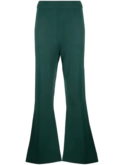 Studio Nicholson Arve Jersey-knit Flared Trousers In Green