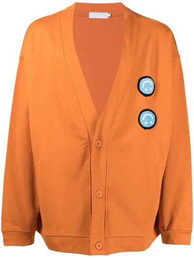 Off Duty Flak Smiley Patch Cardigan In Orange