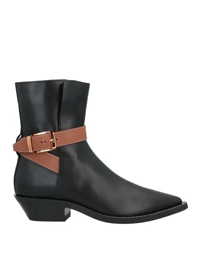 Tod's Ankle Boots In Black