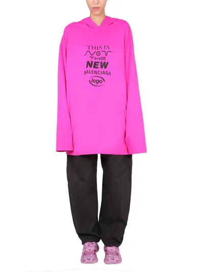 Balenciaga This Is Not Printed Hooded T-shirt In Pink