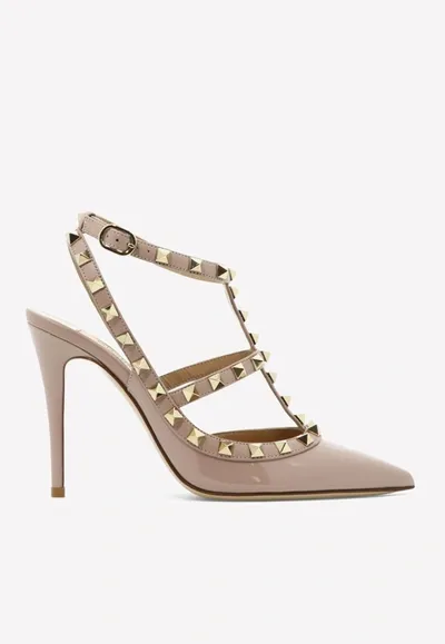 Valentino Garavani 100 Rockstud Leather Pumps In Beige