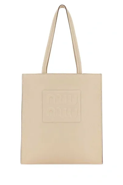 Miu Miu Handbags. In Beige O Tan