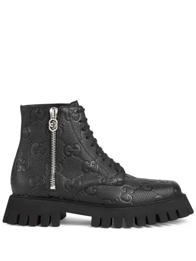 Gucci Gg Supreme Leather Boots In Black