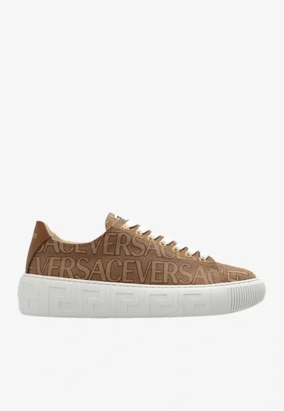 Versace All-over Logo Low-top Sneakers In Brown