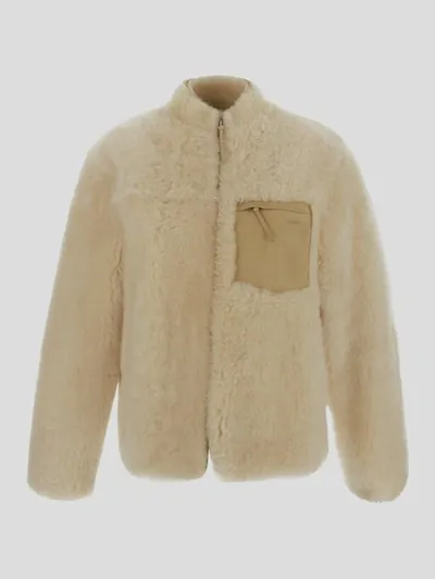 Jil Sander Logo-embossed Shearling Jacket In Beige