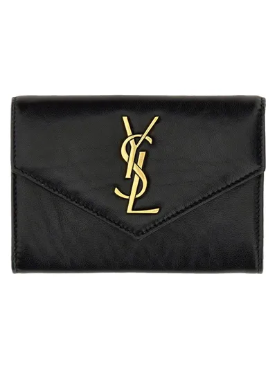 Saint Laurent Logo Plaque Foldover Top Clutch Bag In Black