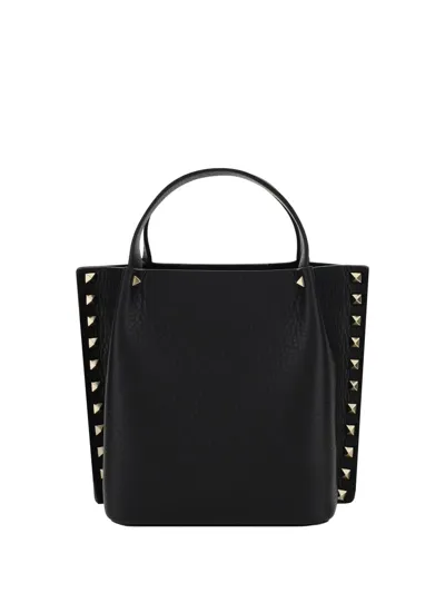 Valentino Garavani Rockstud Top Handle Bag In Black