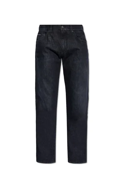 Dolce & Gabbana Logo Tag Tapered Leg Jeans In Black