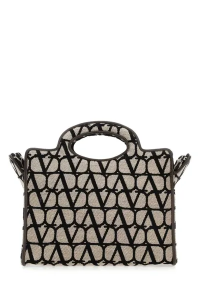 Valentino Garavani Handbags. In Printed