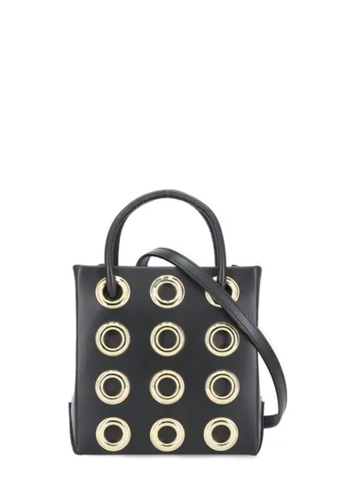 Moschino Eyelet Detailed Tote Bag In Black