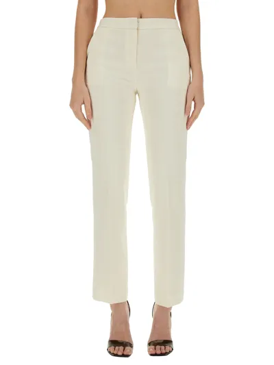 Theory Slim Fit Pants In Ivory