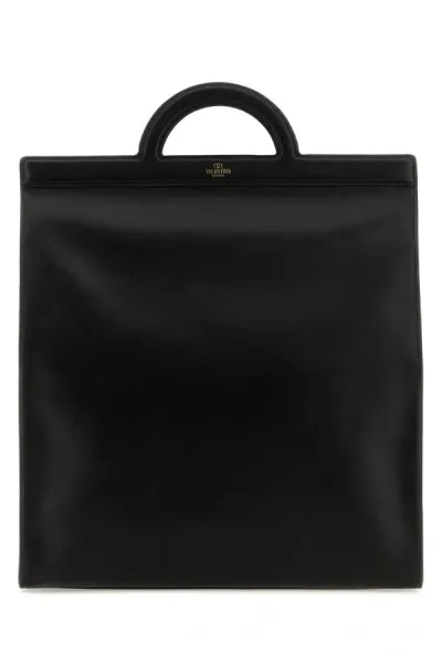 Valentino Garavani Handbags. In Black