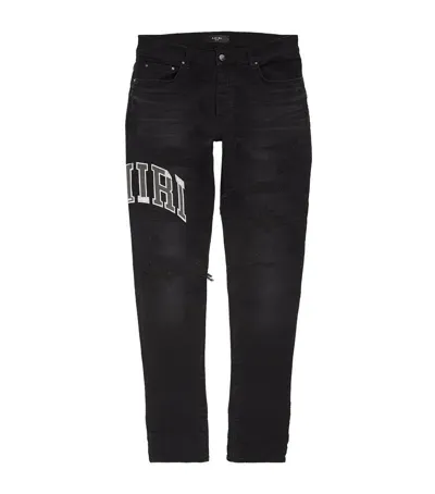 Amiri Varsity Repair Skinny Jeans In Black