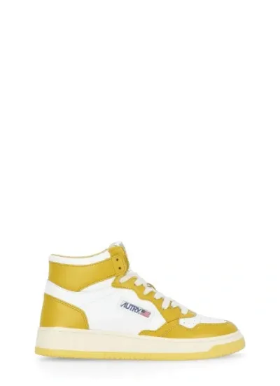 Autry Yellow  Smooth Leather High Top Sneakers In Gold