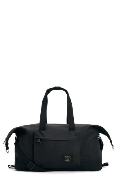 Barbour Field Water Resistant Waxed Cotton Duffle Bag In Black