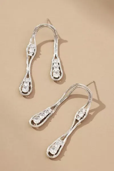 By Anthropologie Wavy Crystal Drop Earrings In Metallic