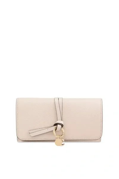 Chloé Logo Charm Laced Wallet In Beige