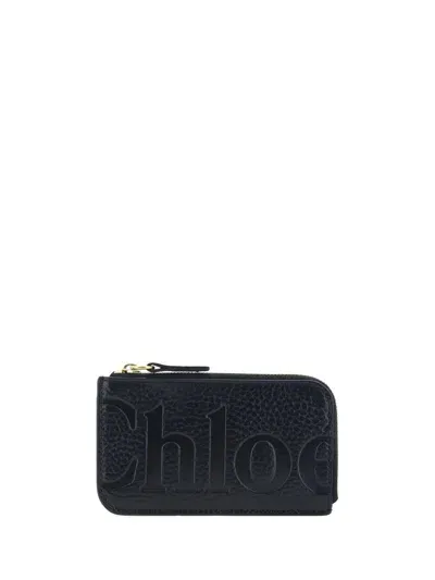 Chloé Logo Embossed Zipped Cardholder In Black