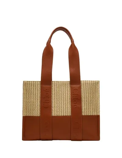 Chloé Woody Medium Tote Bag In Leather And Raffia With Embroidered Logo In Brown