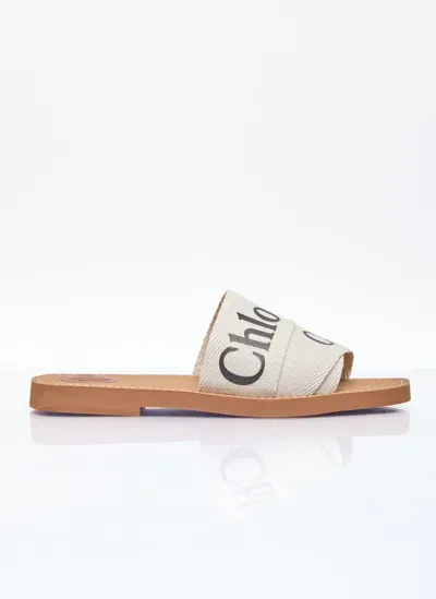 Chloé Woody Logo-print Canvas Slides In Cream