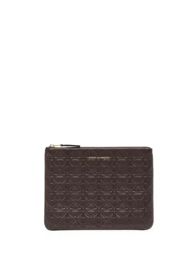 Comme Des Garçons Logo-stamp Embossed Leather Wallet In 褐色