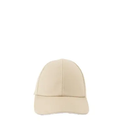 Courrèges Logo Embroidered Baseball Cap In Beige