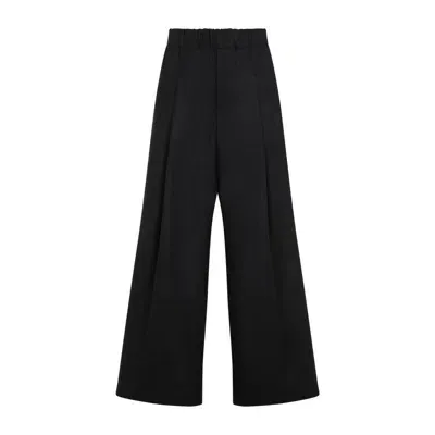 Dries Van Noten Pleat Detailed Wide Leg Trousers In Black