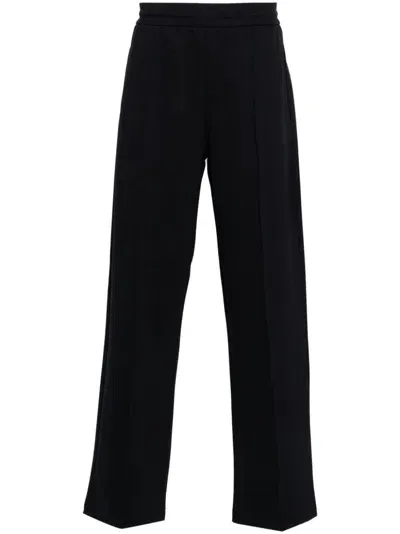 Emporio Armani Logo-plaque Trousers In Blue