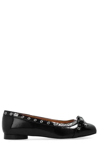 Ganni Eyelet Bow Ballerinas In Black 099