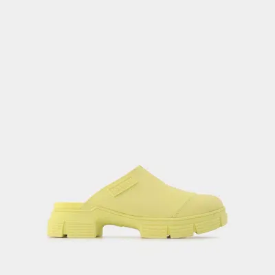 Ganni Recycled Rubber Retro Mules In Yellow