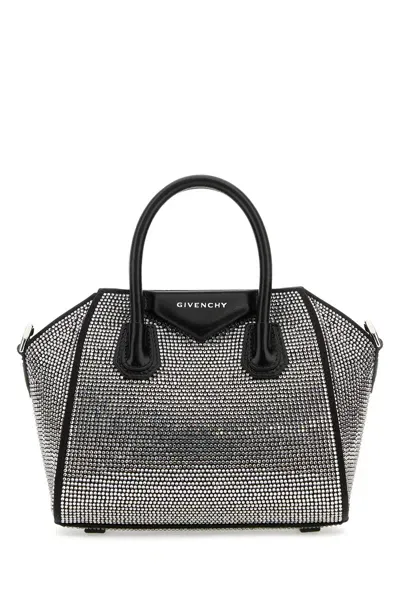 Givenchy Handbags. In Black