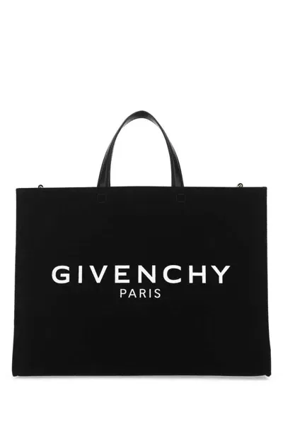 Givenchy Handbags. In Black