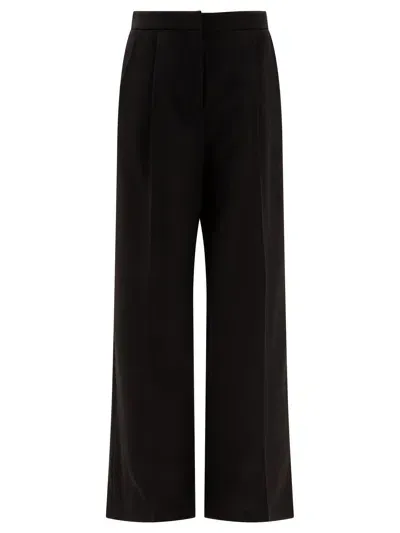 Givenchy High Rise Pleated Wool Trousers For Women In Black