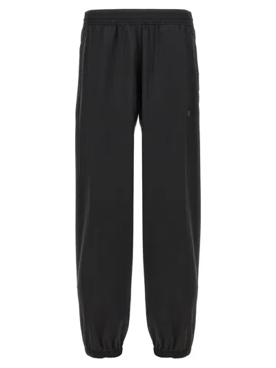 Givenchy Logo Placcetta Pants In Black