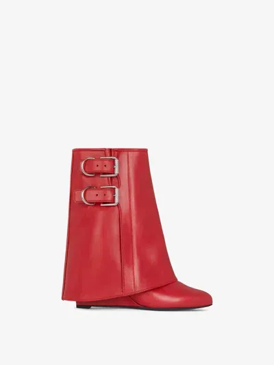 Givenchy Shark Lock Buckles Ankle Boots In Leather In Red