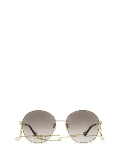 Gucci Eyewear Sunglasses In Gold