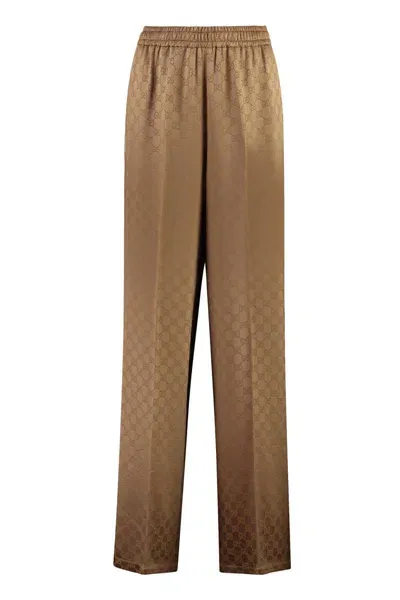 Gucci Gg Motif Jacquard Trousers In Brown