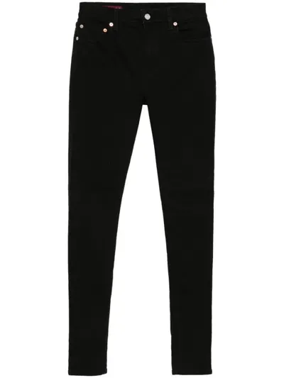 Gucci Logo-patch Jeans In Black