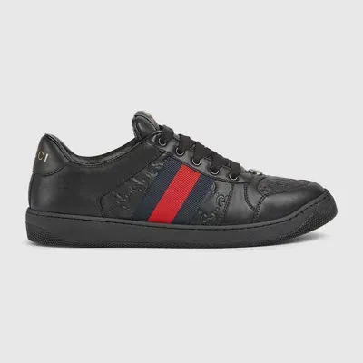 Gucci Gg Embossed Leather Low-top Sneakers In 1074