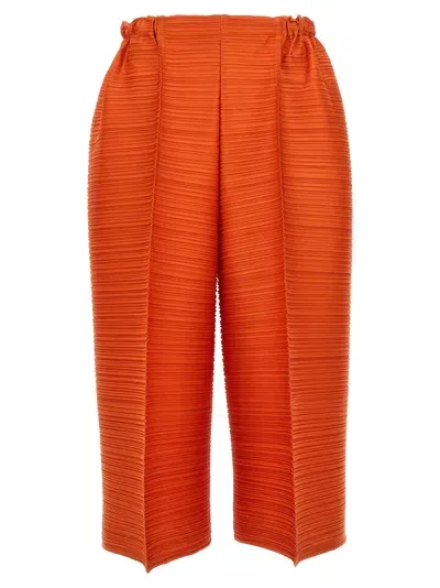 Issey Miyake Thicker Bounce Cropped Trousers In Orange